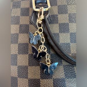 UNBRANDED BUTTERFLY BAG CHARM
